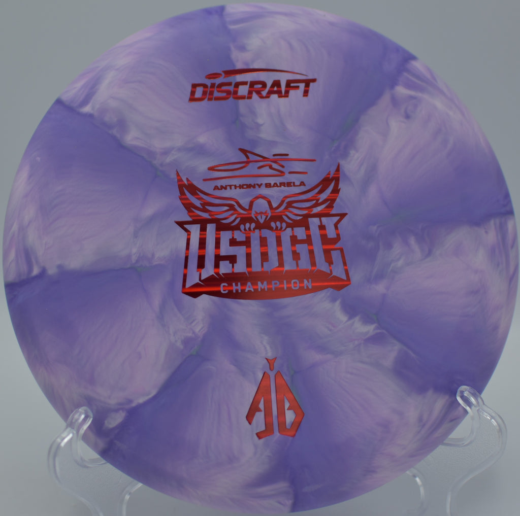 Swirled CT Focus placed beside a tree at Oak Hollow DGC in High Point, NC, great for approach shaping.