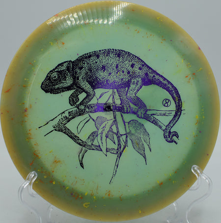 Splatter S-Blend X-Out Pharaoh Infinite Discs distance driver trusted for hyzer flips at Moraine State Park Disc Golf Course in Portersville, Pennsylvania.