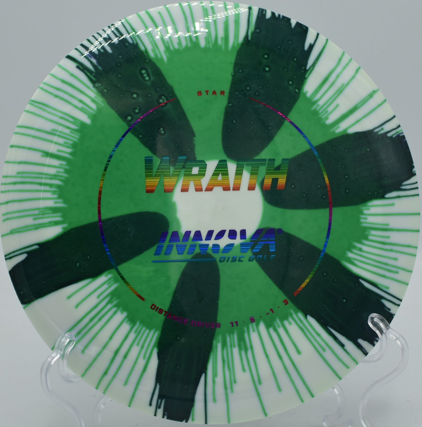 Colorful I-Dye Wraith carving through the fairway at DeLaveaga Disc Golf Course in Santa Cruz, California