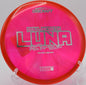 Paul McBeth Z Swirl Luna resting on the green at Idlewild Disc Golf Course in Burlington, Kentucky, featuring beautiful swirl patterns and consistent putting performance.

