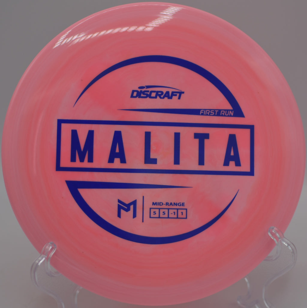 ESP Malita holding a neutral-stable midrange line through the trees at Crestview Park Disc Golf Course in Huntington, Indiana.