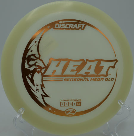 Mega Glow Heat mid-flight on a straight-line drive at Waterworks Park Disc Golf Course in Kansas City, Missouri.