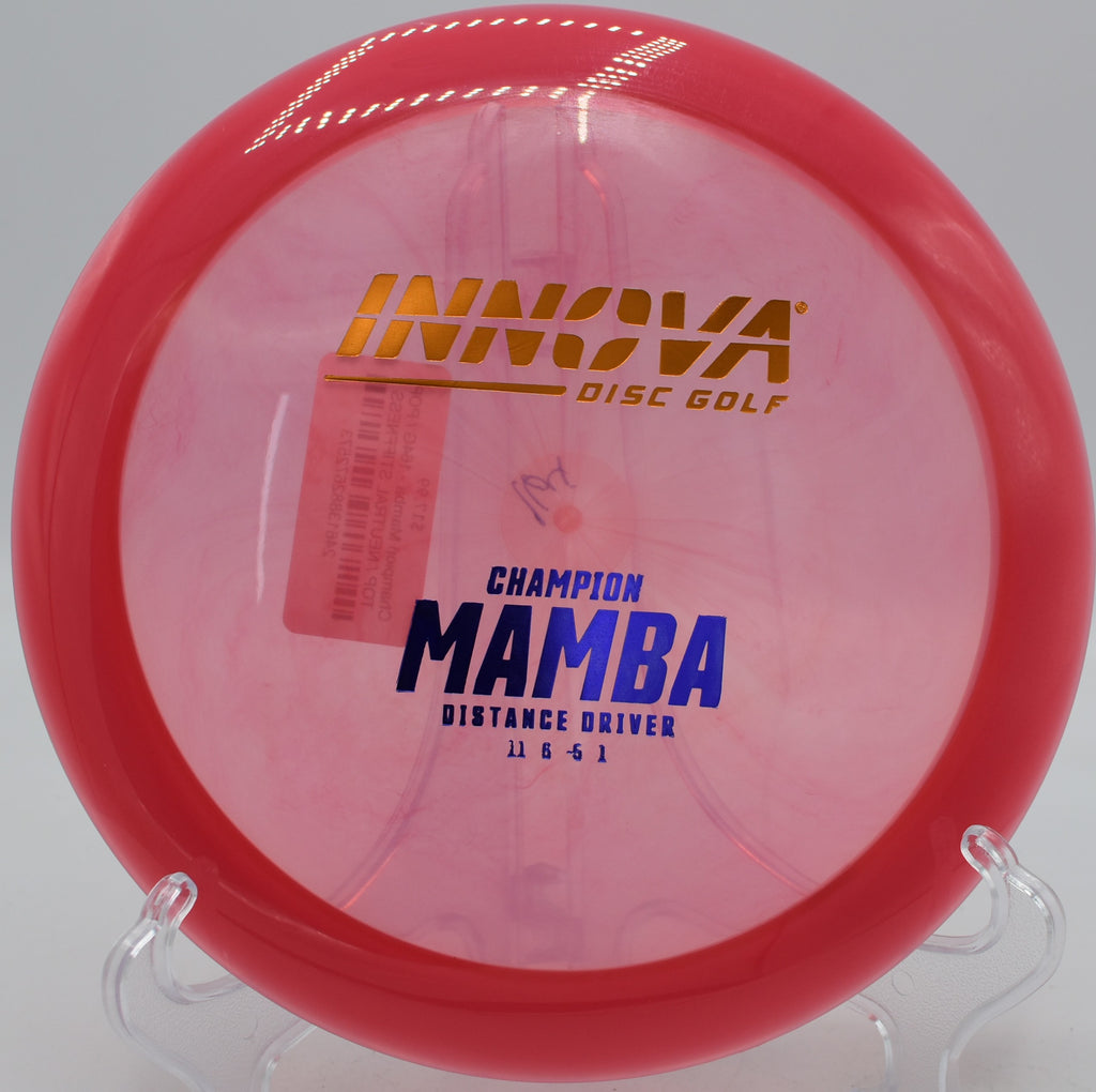 Power thrower launching a long-turning backhand with a Champion Mamba at Trophy Club Disc Golf Course in Texas