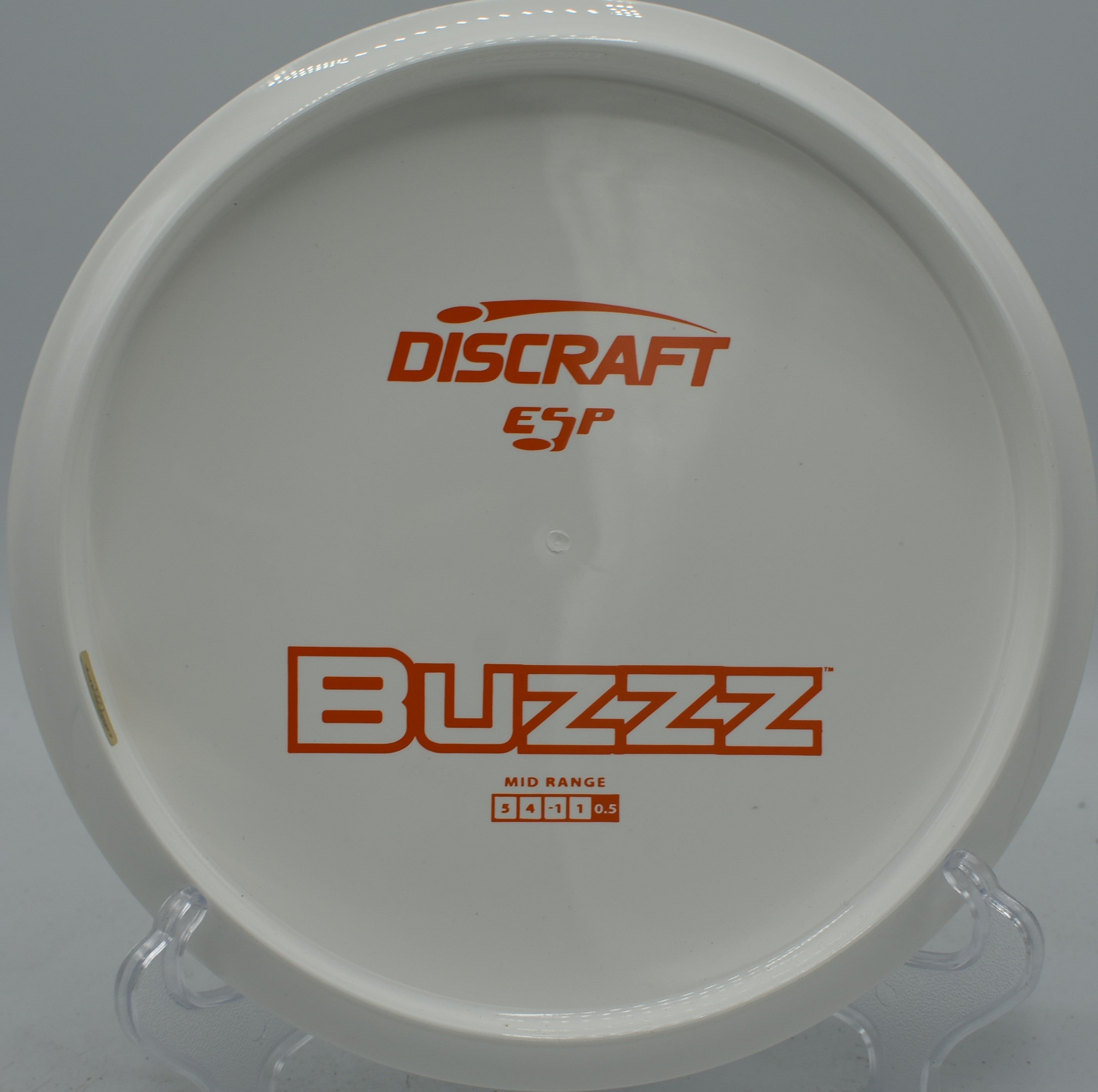 Discraft Solid White ESP Buzzz displayed at Harmony Bends DGC, Columbia MO for technical fairway precision