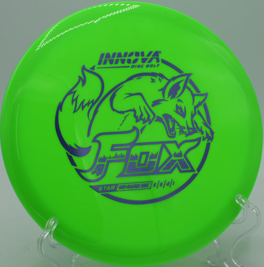 Innova Star Fox reliable midrange disc flying straight downhill at DeLaveaga Disc Golf Course in Santa Cruz, California.