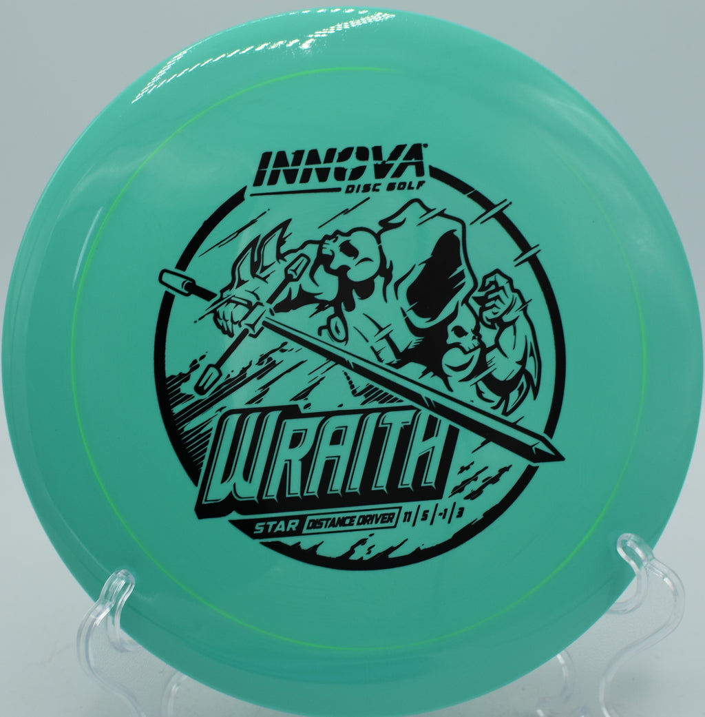 Star Wraith disc golf driver shaping a wide S-curve at Northwood Black Disc Golf Course in Morton, Illinois