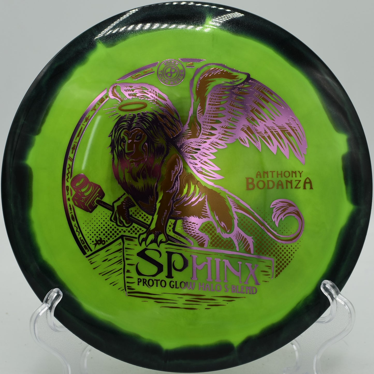 Sphinx glidey driver floating down wooded fairway at Idlewild Disc Golf Course in Burlington, Kentucky