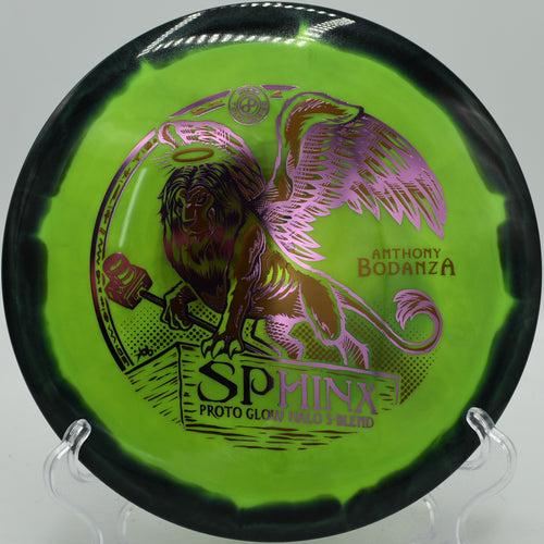 Sphinx glidey driver floating down wooded fairway at Idlewild Disc Golf Course in Burlington, Kentucky