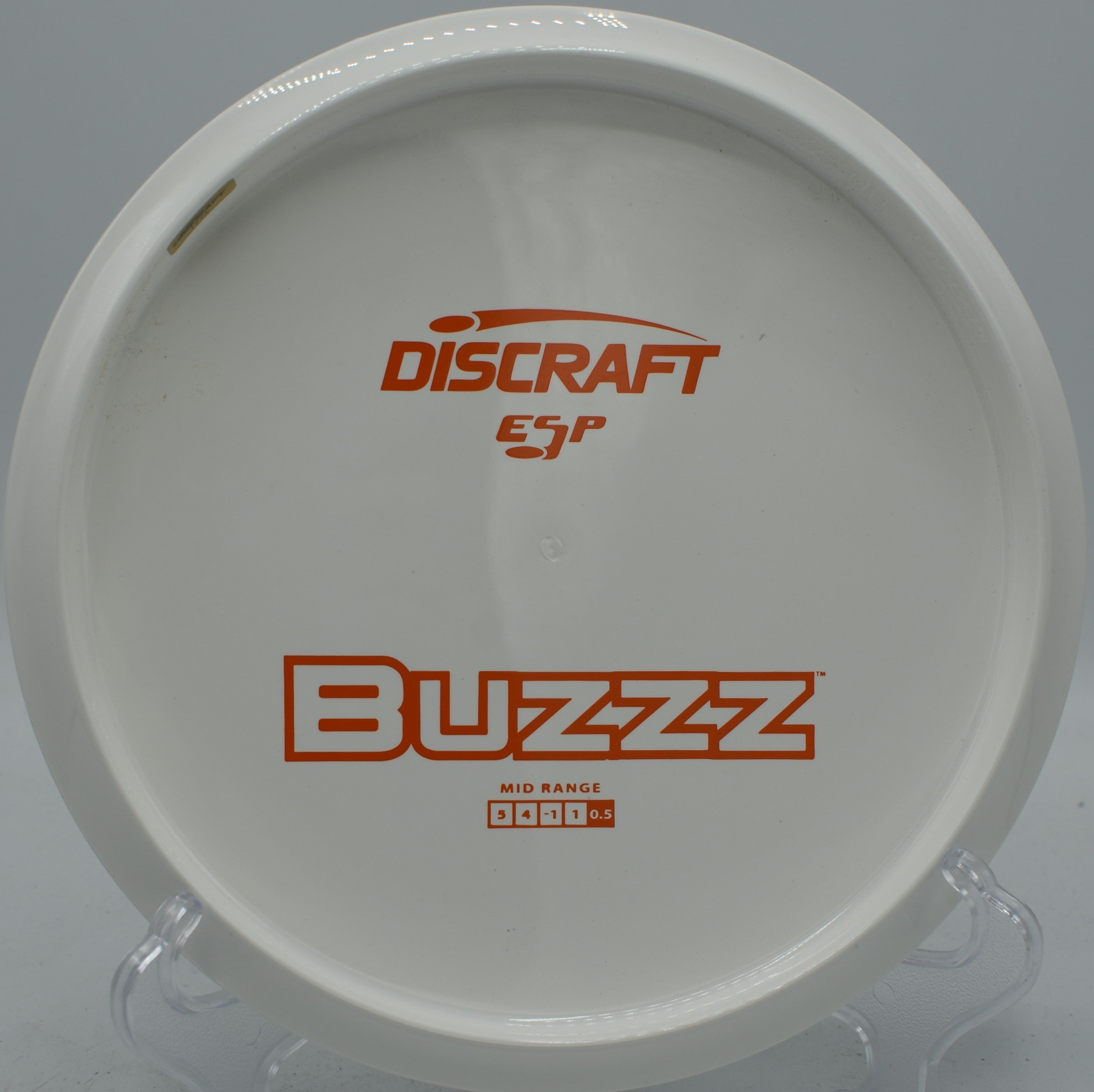 Solid White ESP Buzzz at Blue Ribbon Pines DGC, East Bethel MN for reliable disc golf accuracy and consistent flight