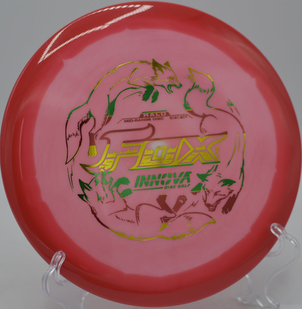 Two-tone Halo Star Fox stable flight captured mid-spin at Fountain Hills Disc Golf Course in Fountain Hills, Arizona.