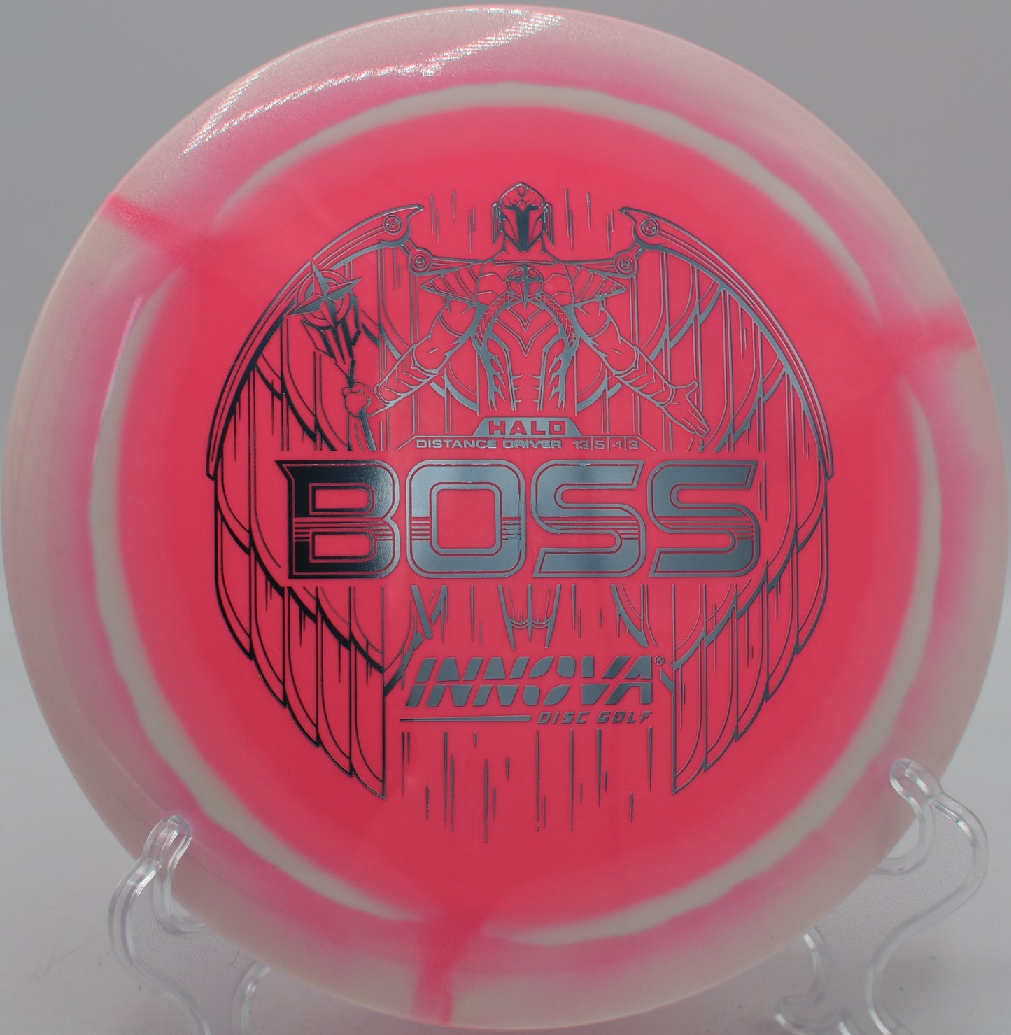 Halo Star Boss distance driver launched on a powerful turnover at DeLaveaga Disc Golf Course in Santa Cruz, California