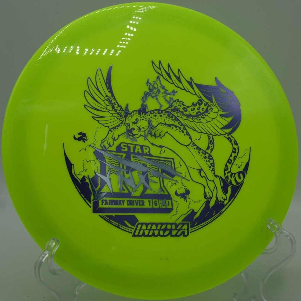Star Lynx fairway driver holding a long turnover line through woods at Cedar Grove Disc Golf Course in Kingwood, West Virginia