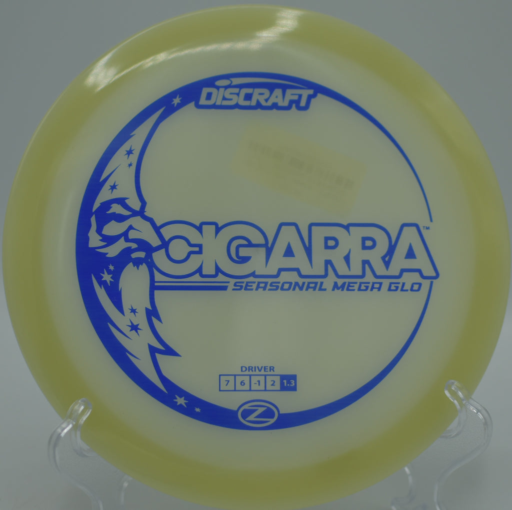 Mega Glow Z Cigarra glowing under blacklight skies at Eagles Crossing Disc Golf Course in Hawk Point, Missouri.