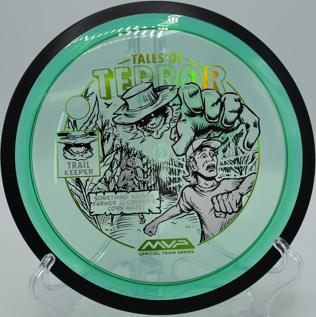 MVP Proton Trail flying a smooth hyzer at Sandy Point Resort Disc Golf Ranch in Wisconsin with Halloween graphics glowing.