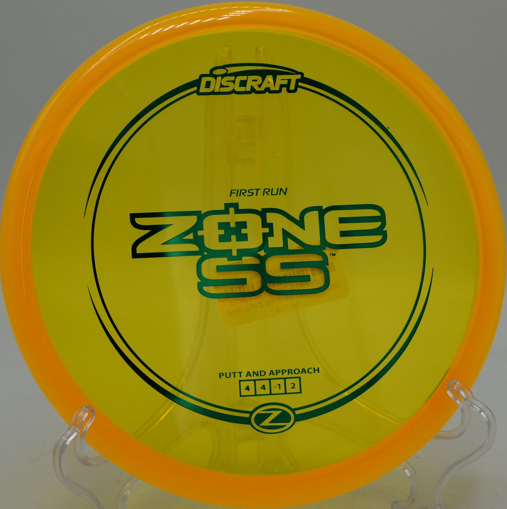 Discraft Z Zone SS flying flat over downhill slope at Glenwood DGC in NY