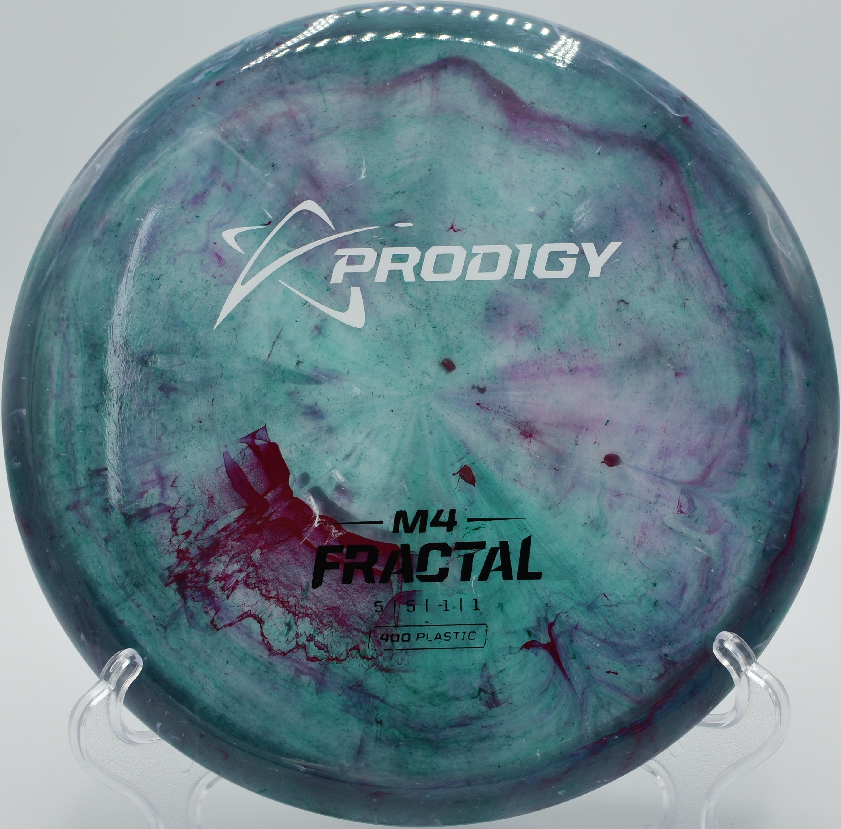 400 Fractal M4 disc golf midrange holding a smooth turnover line at Sunray Disc Golf Course, Fairmont, West Virginia