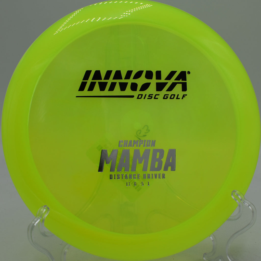 Champion Mamba slicing an S-curve through a wooded gap at Water Works Park in Kansas City, Missouri