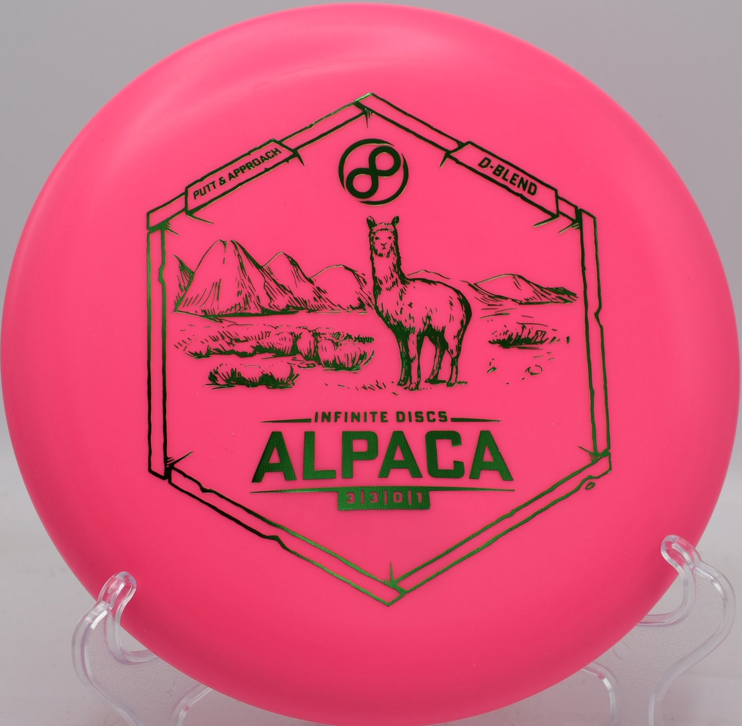 Infinite D-Blend Alpaca holding a straight line through the chains on a downhill putt at Idlewild DGC.

