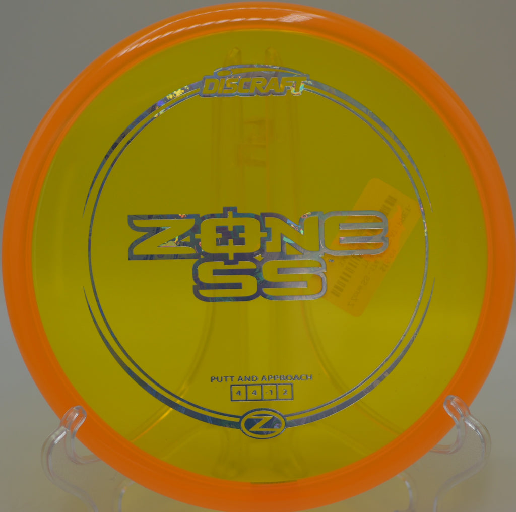 Discraft Z Zone SS thrown with finesse on an anhyzer line at Lake Casitas Disc Golf Course in Ventura, California.