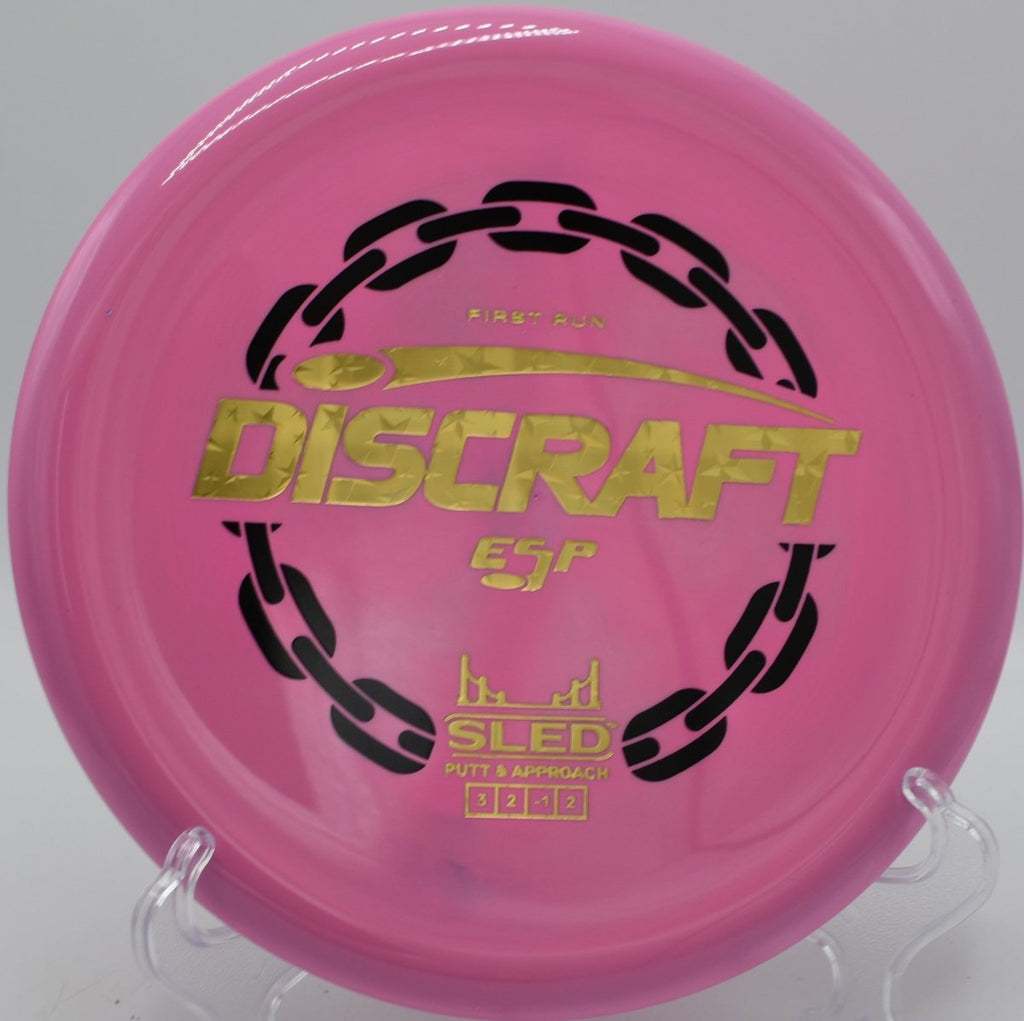 Discraft First Run ESP Sled straight putter shot through trees at Dretzka Park Disc Golf Course in Milwaukee, Wisconsin