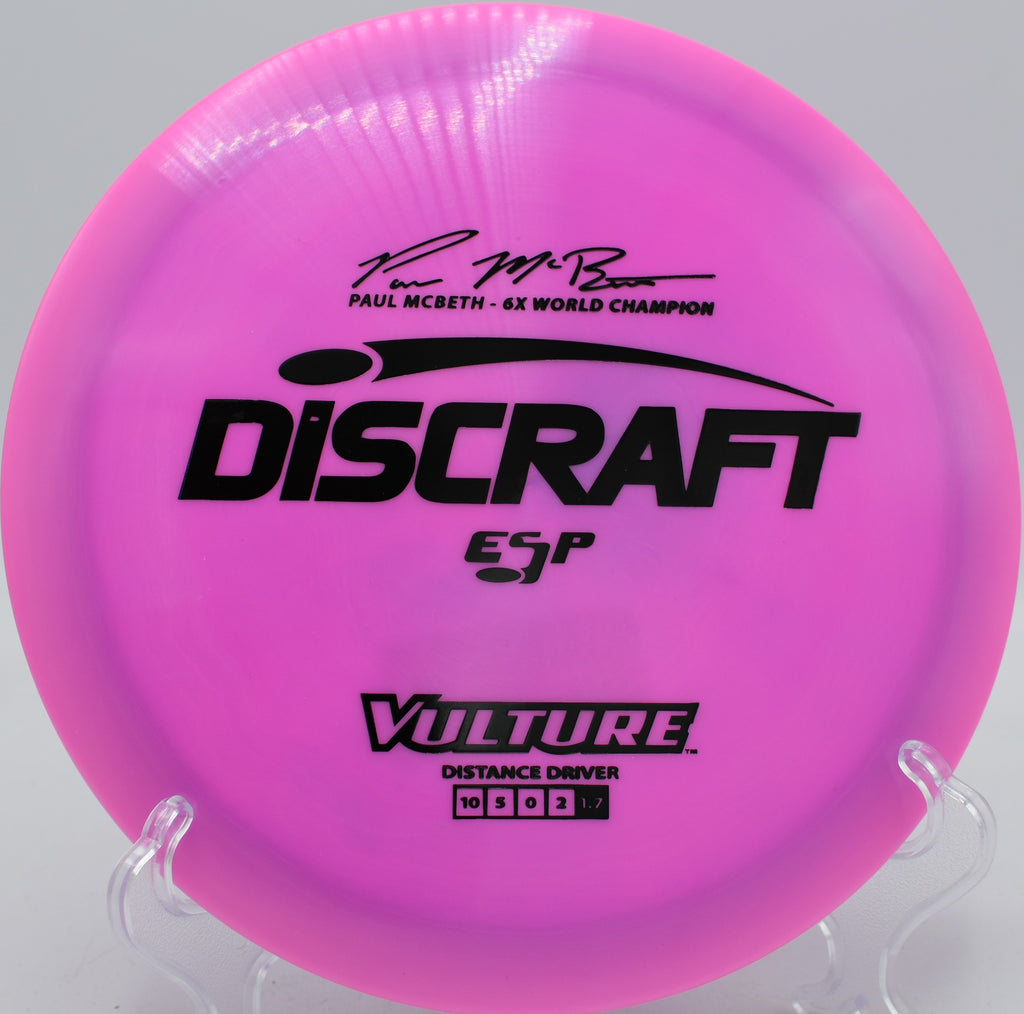 Discraft ESP Vulture Paul McBeth signature fairway driver flying a controlled hyzer at Idlewild Disc Golf Course in Burlington, Kentucky.
