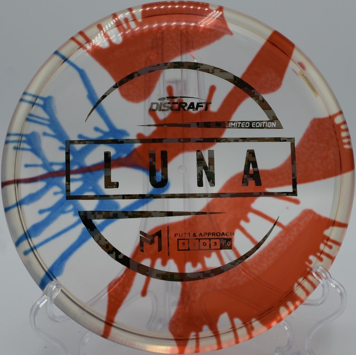 Fly Dye Z Luna disc golf putter gliding toward the chains at McDade Park Disc Golf Course, Scranton, Pennsylvania