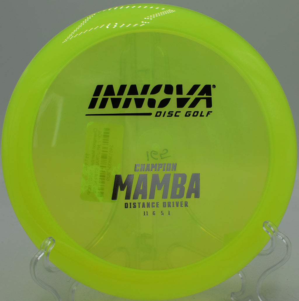 Disc golfer throwing a graceful glide shot with a Champion Mamba at SeaTac Disc Golf Course in Washington