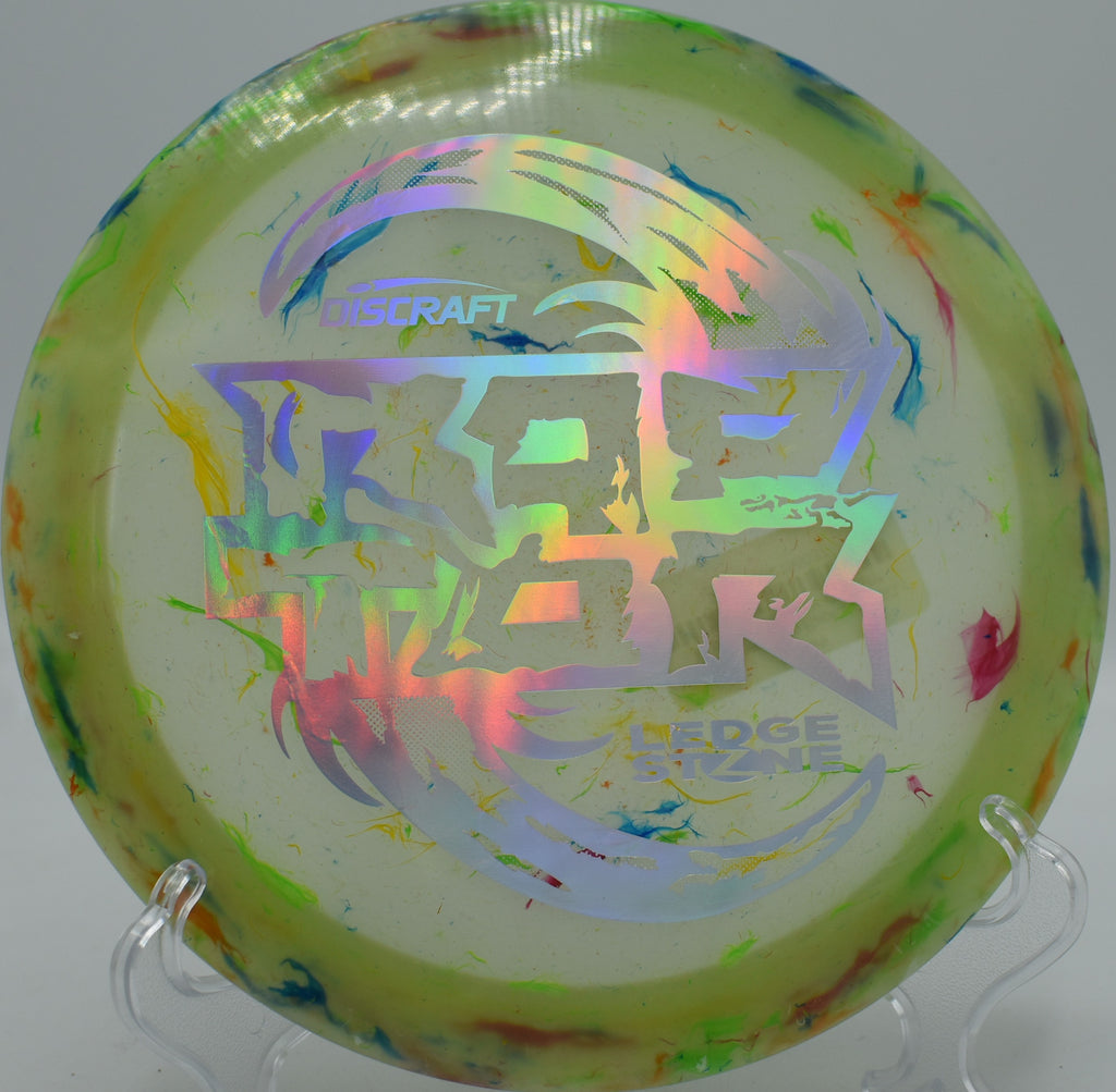 Pastel swirl and soft glow of the Jawbreaker Z Glo Raptor captured on a late evening round at Renaissance Gold in Charlotte, North Carolina