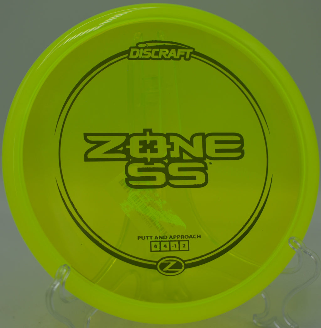 Z Zone SS pushed flat down a wooded fairway at Brackett’s Bluff Disc Golf Course in Huntersville, North Carolina.