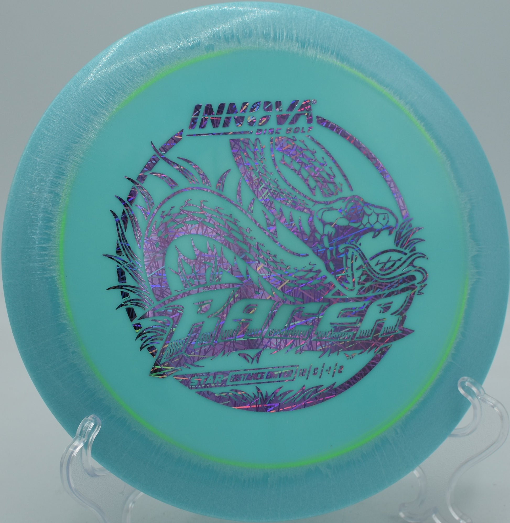 Innova Star Racer holding a laser-straight forehand line with a forward fade at Cedar Hill Disc Golf Course in Nashville, Tennessee