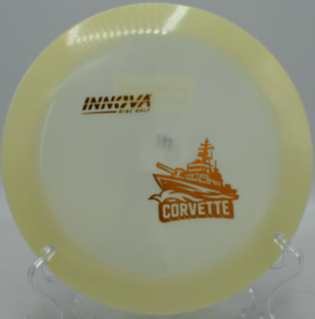 Ultra-bright Glow Corvette slicing through early evening air at Harmony Bends.

