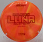Discraft Z Swirl Luna resting on moss at Moraine State Park in Portersville, Pennsylvania, built for precision approaches and clean releases.

