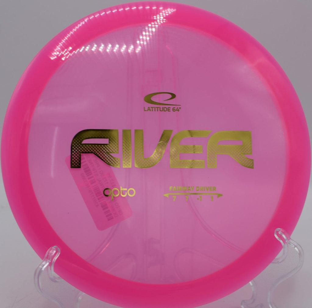 Latitude 64 Opto River glide driven fairway driver flying straight at Milo East Disc Golf Course in Estacada Oregon