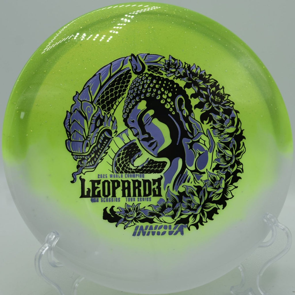 Duo Leopard3 Ohn Scoggins Tour Series fairway driver resting near tee pad at Greenway Park Disc Golf Course in Broomfield, Colorado