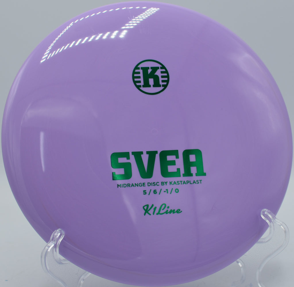 K1 Svea launched on a hyzer-flip line at Sabattus Disc Golf Course in Sabattus, Maine, trusted by players for controlled understability.


