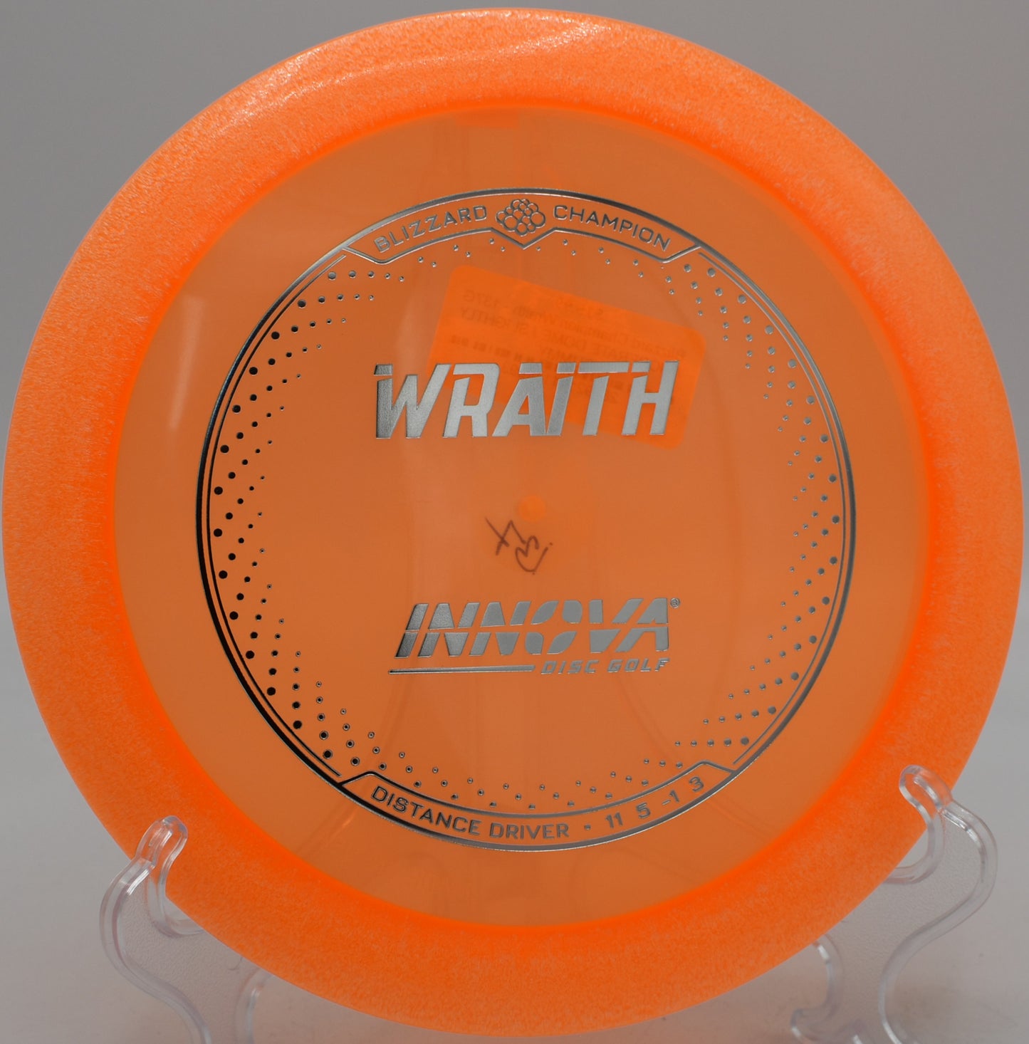 Lightweight Blizzard Wraith carving a gentle flex line at Two Rivers Disc Golf Course in Highlandville, Missouri