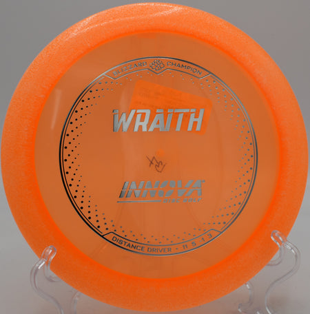 Lightweight Blizzard Wraith carving a gentle flex line at Two Rivers Disc Golf Course in Highlandville, Missouri