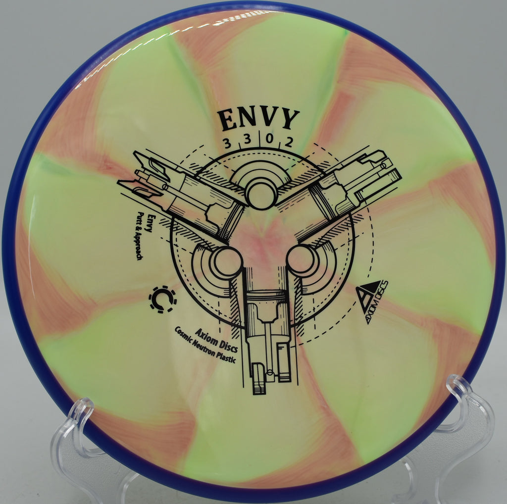 MVP Cosmic Neutron Envy floating on a glidey approach at Rollin Ridge Disc Golf Course in Reedsville, Wisconsin.
