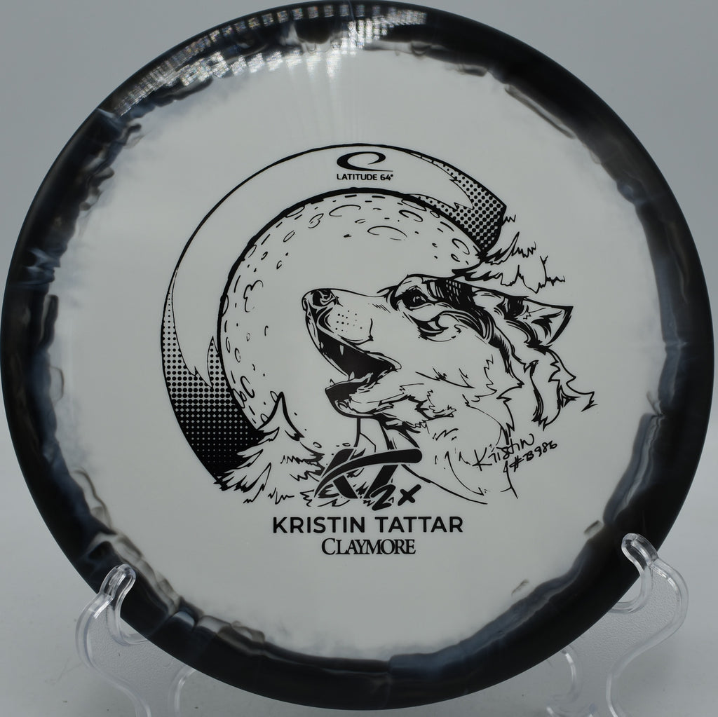 Latitude 64° Gold Orbit Claymore 2024 Kristin Tattar signature disc floating approaches at Circle C Ranch Disc Golf Course in Austin, Texas.