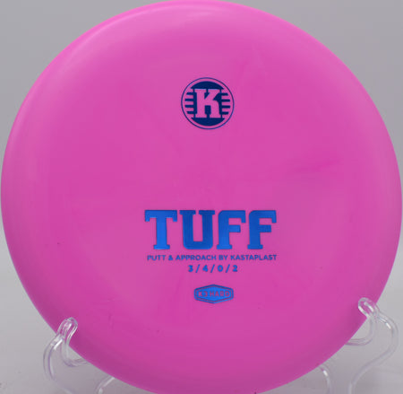 K3 Hard Tuff released on a smooth hyzer line, fading gently toward the pin with controlled stability at Mora DiscGolfPark.

