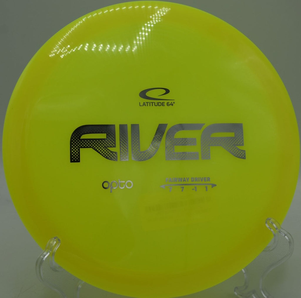 Latitude 64 Opto River glide heavy fairway driver threading woods at Morristown Disc Golf Course in Morristown Vermont