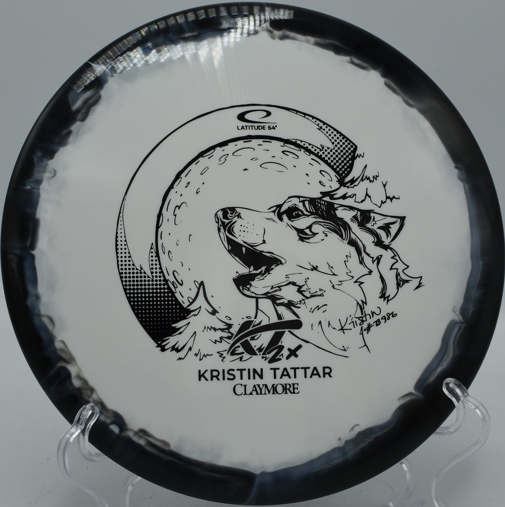 Kristin Tattar 2024 Gold Orbit Claymore Latitude 64° midrange shaping turnovers at Roland Park Disc Golf Course in Akron, Pennsylvania.