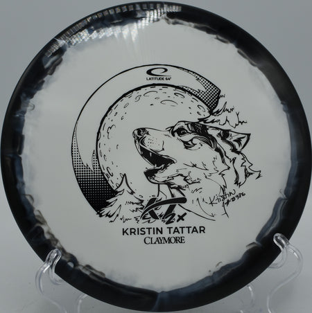 Kristin Tattar 2024 Gold Orbit Claymore Latitude 64° midrange shaping turnovers at Roland Park Disc Golf Course in Akron, Pennsylvania.