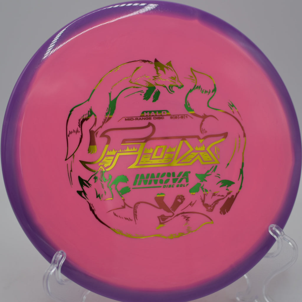 Halo Star Fox mid-flight during a clean, controlled turnover drive at Maple Hill Disc Golf Course in Leicester, Massachusetts.