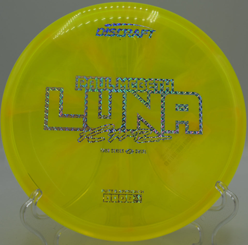 Z Swirl Luna hovering above the circle at Lake Marshall Disc Golf Course in Montross, Virginia, trusted for controlled spin putts and fade-stable upshots.

