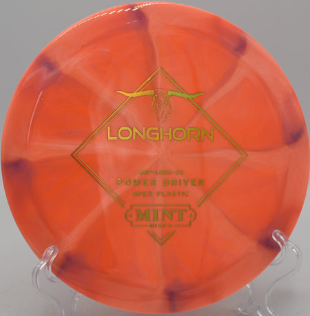 Apex Swirl Longhorn disc shaping a long turnover line at Northwood Black Disc Golf Course in Morton, Illinois