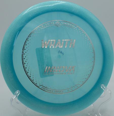 Disc golfer unleashing a low-effort drive with the Blizzard Wraith at Pier Park in Portland, Oregon