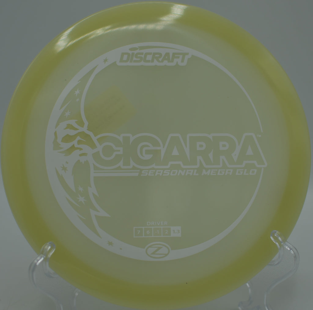 Mega Glow Z Cigarra gliding smooth and overstable toward the basket at Waterworks Park Disc Golf Course in Kansas City, Missouri.