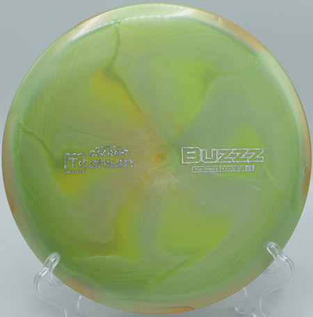 Discraft Titanium Buzzz – Stable midrange with a gentle turn and reliable fade, great for players looking for precision on controlled throws.