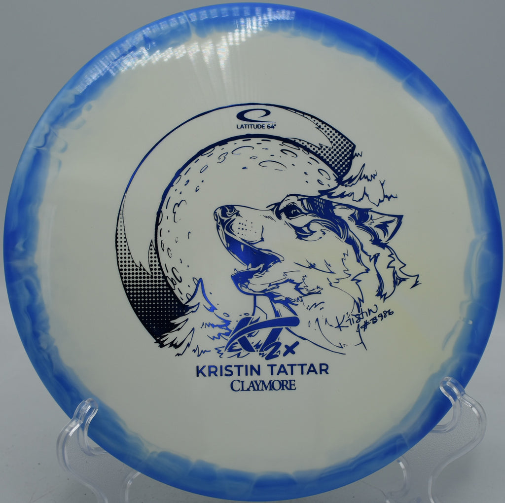 Gold Orbit Claymore Kristin Tattar Latitude 64° 2024 midrange throwing dead straight at Kensington Metropark Disc Golf Course in Milford, Michigan.